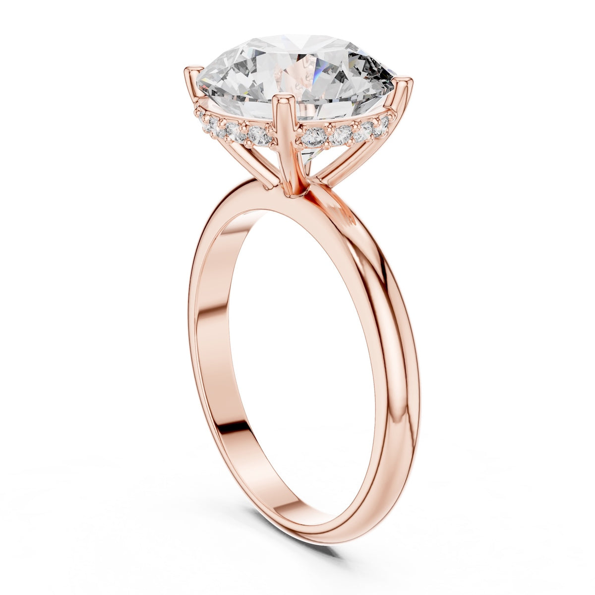 Rose gold ring with a large zircon on a white background 