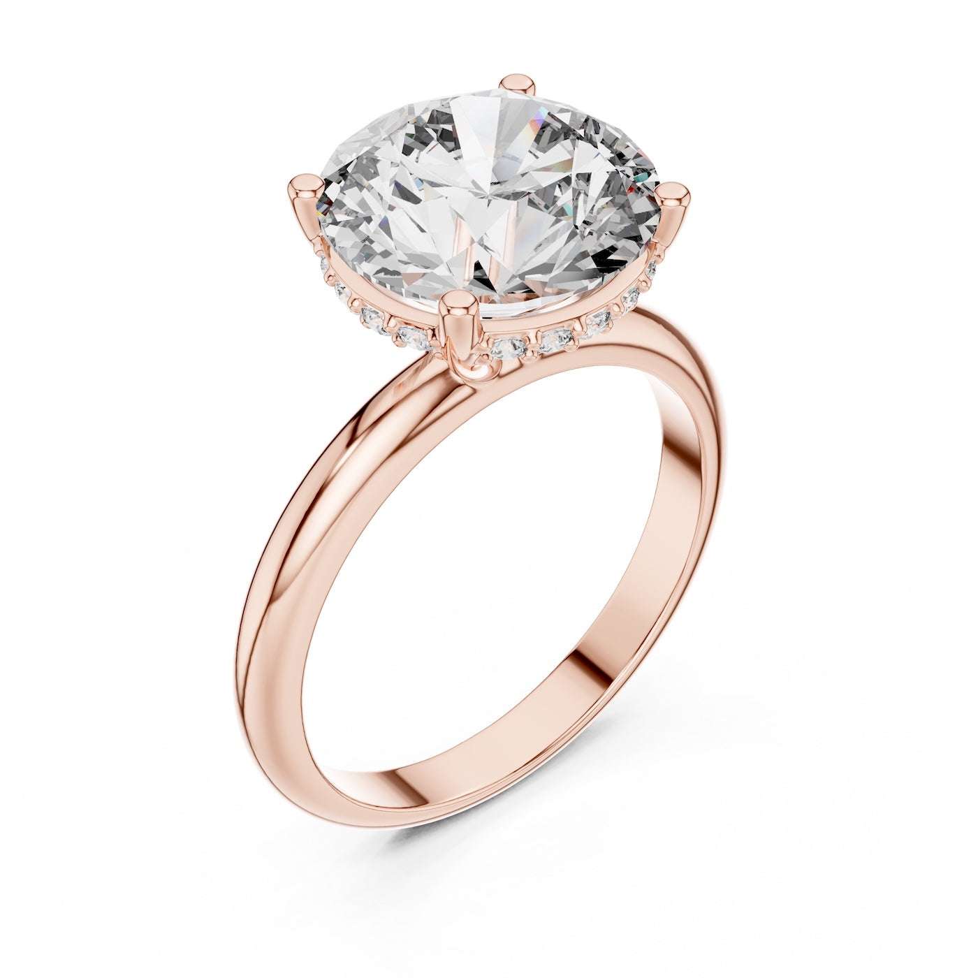 Rose gold ring with a large zircon on a white background 