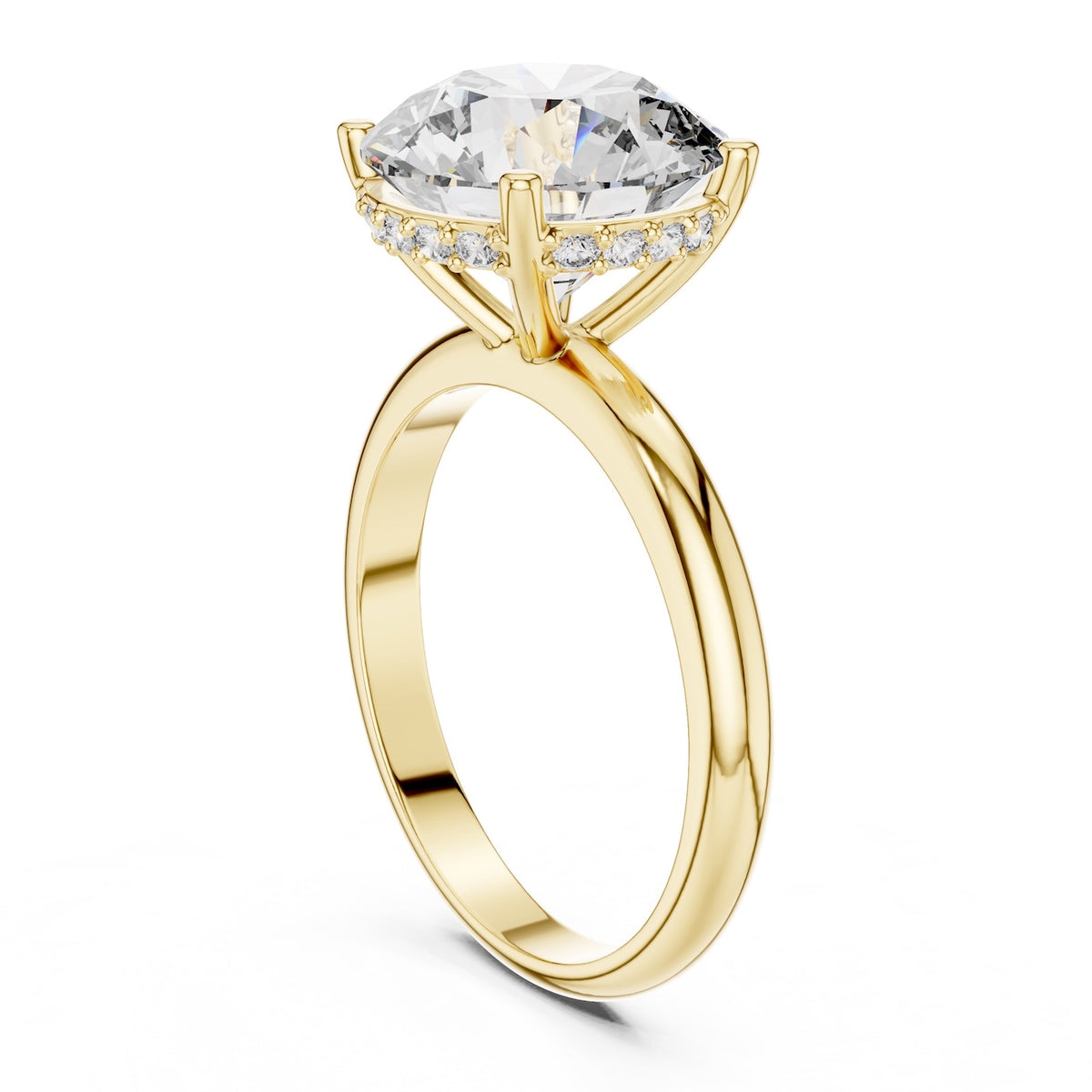 Gold ring with a large zircon on a white background 