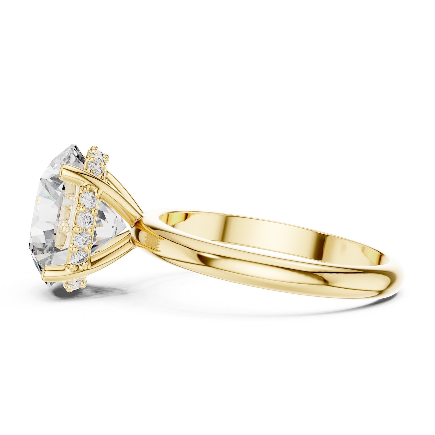 Gold ring with a large zircon on a white background 