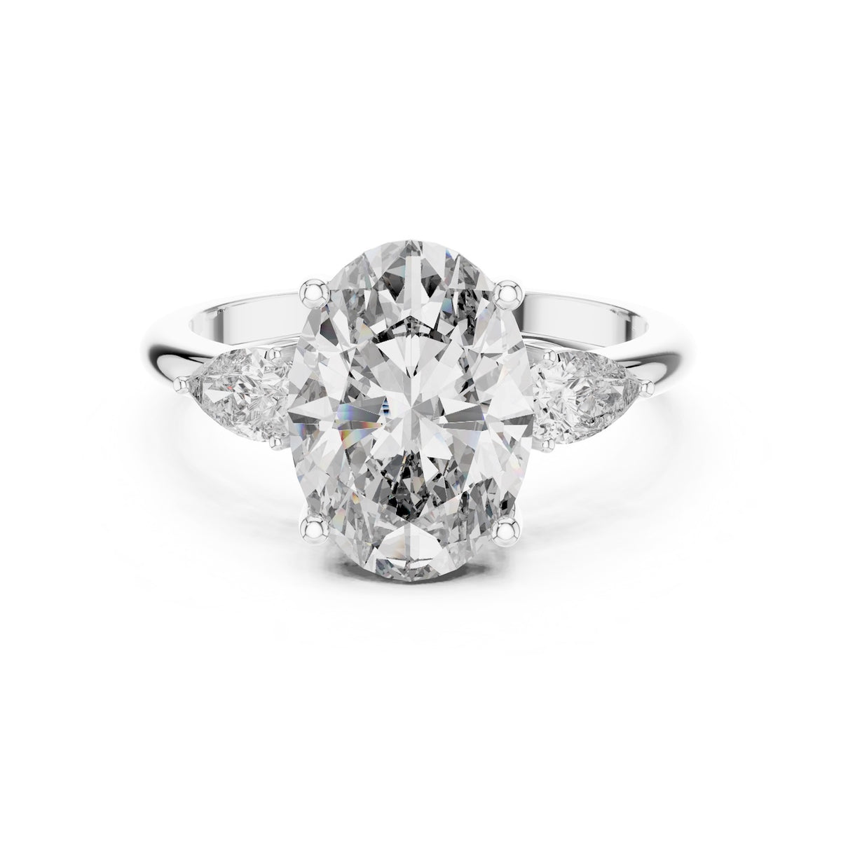 Silver ring with a oval-shaped center stone on a white background 