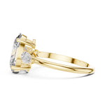 gold plated Silver ring with a oval-shaped center stone on a white background 