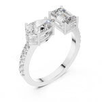 Two stone open silver ring with different cut stones on a white background 