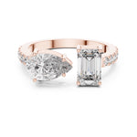 Two stone open rose-gold plated silver ring with different cut stones on a white background 
