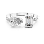 Two stone open silver ring with different cut stones on a white background 