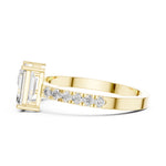 Two stone open gold plated silver ring with different cut stones on a white background 