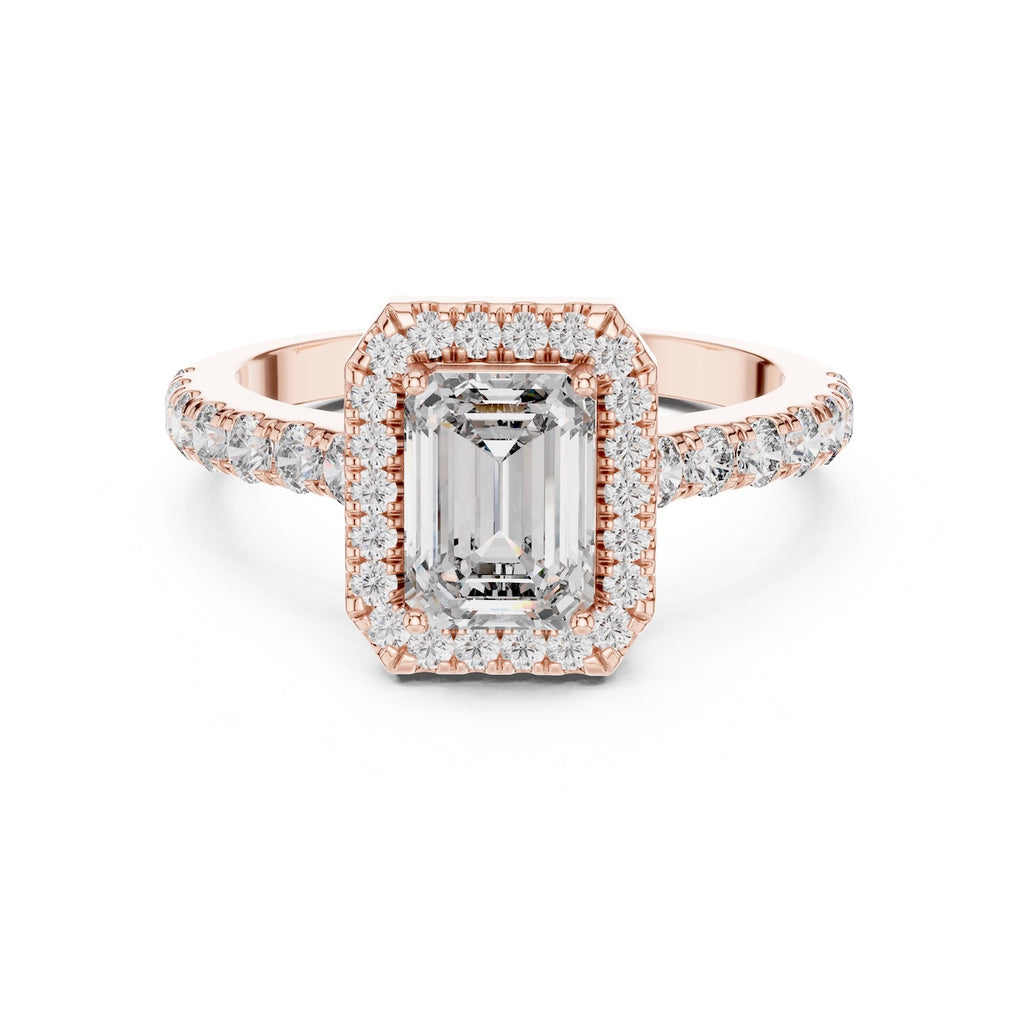 Rose-gold plated Silver ring with a central emerald-cut stone and halo on a white background #rose-gold