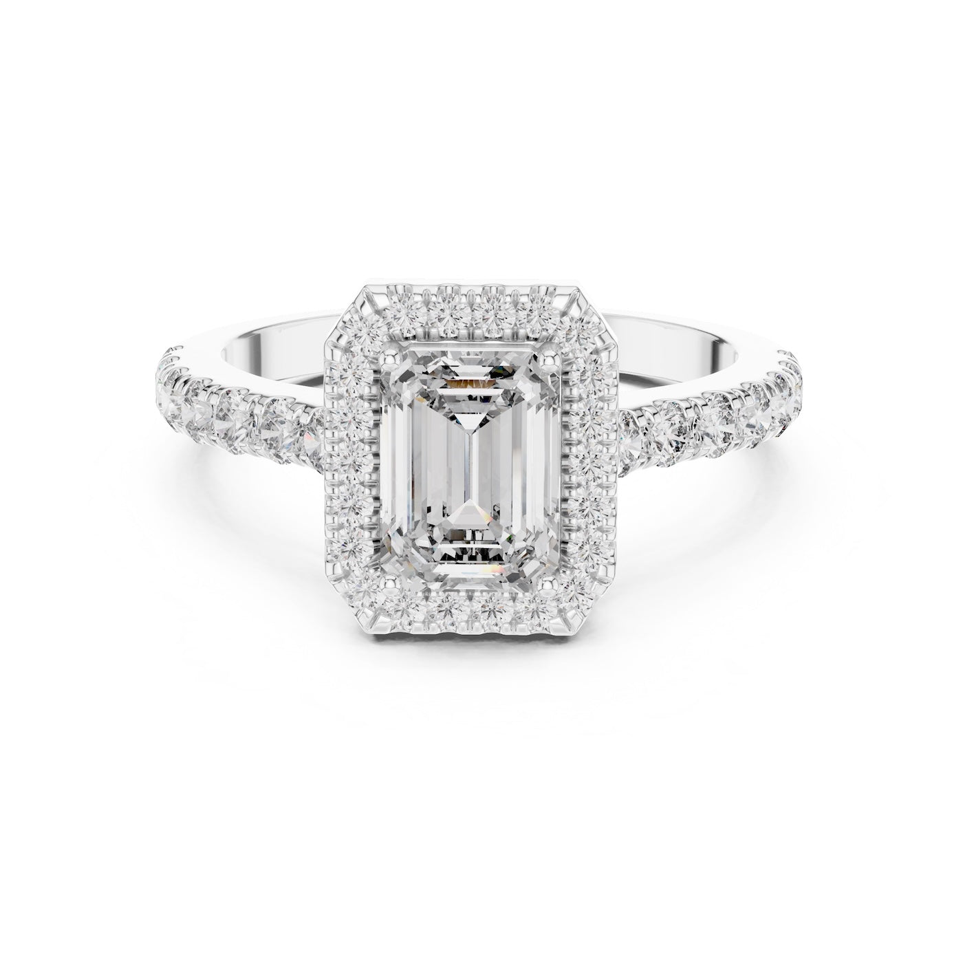 Silver ring with a central emerald-cut stone and halo on a white background 