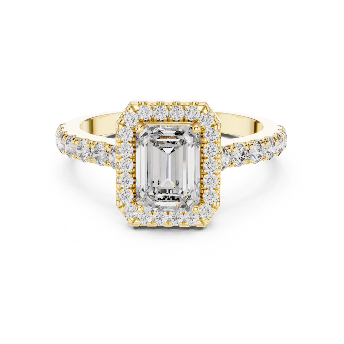 gold plated Silver ring with a central emerald-cut stone and halo on a white background 
