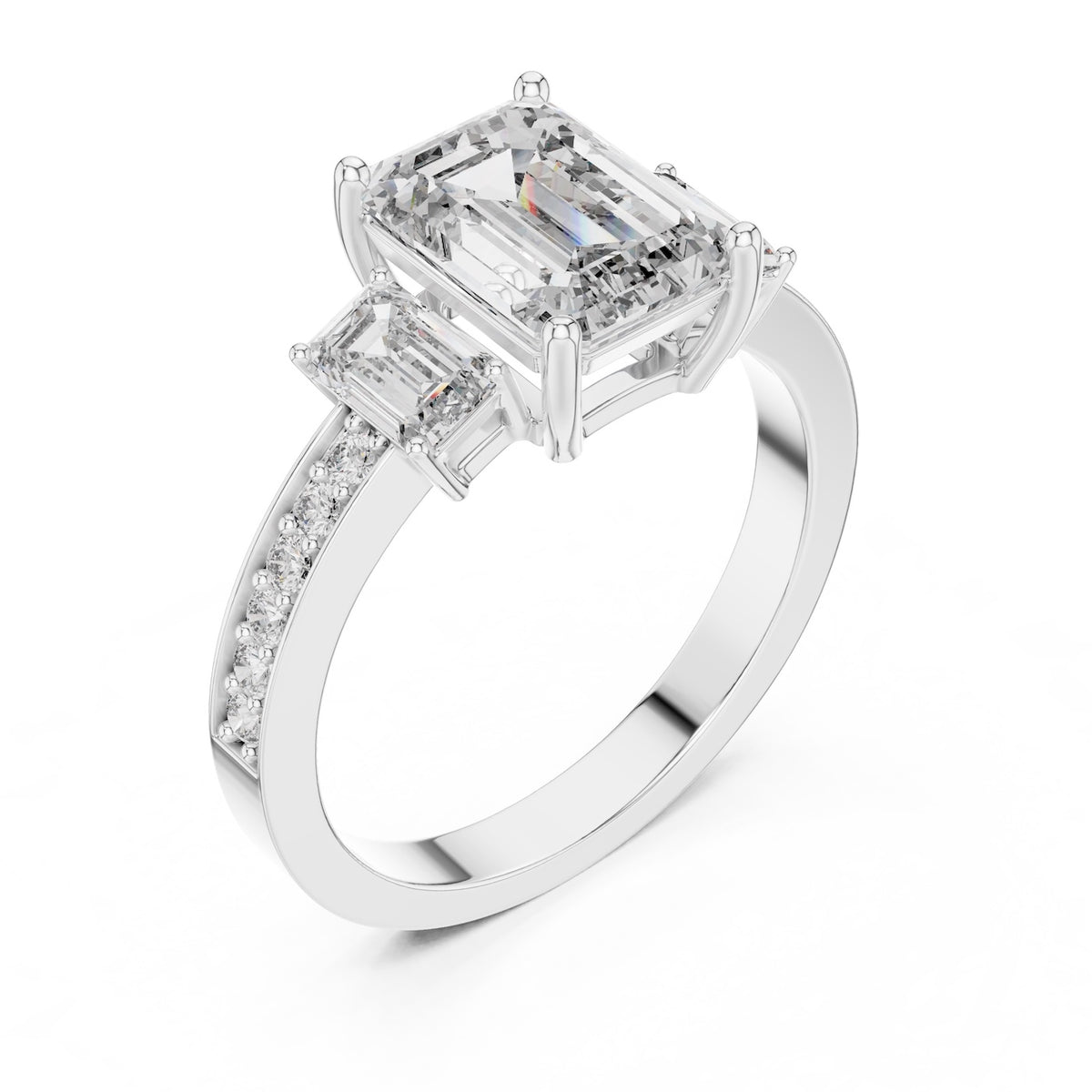 Silver ring with three emerald-cut center stones and smaller round stones on a white background 
