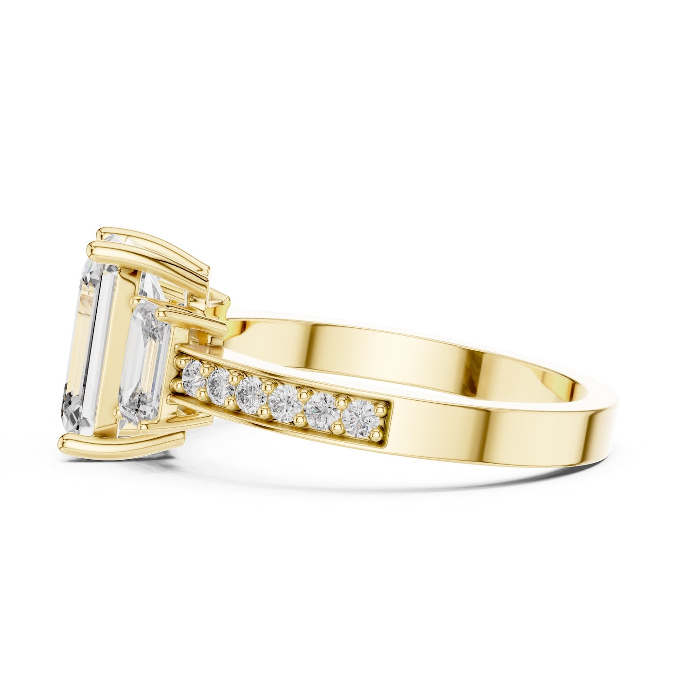 Gold plated Silver ring with three emerald-cut center stones and smaller round stones on a white background 