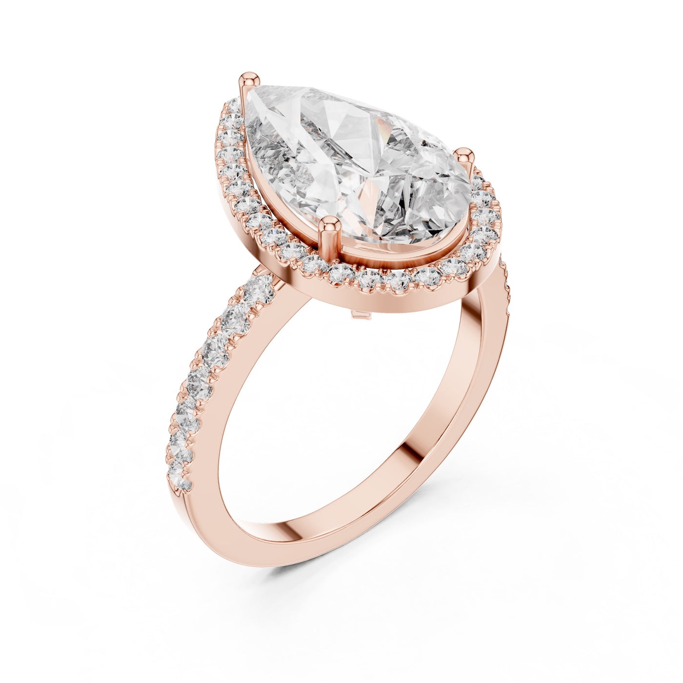 Rose-gold plated silver ring with a pear-shaped center stone on a white background 