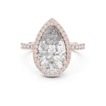 Rose-gold plated silver ring with a pear-shaped center stone on a white background 