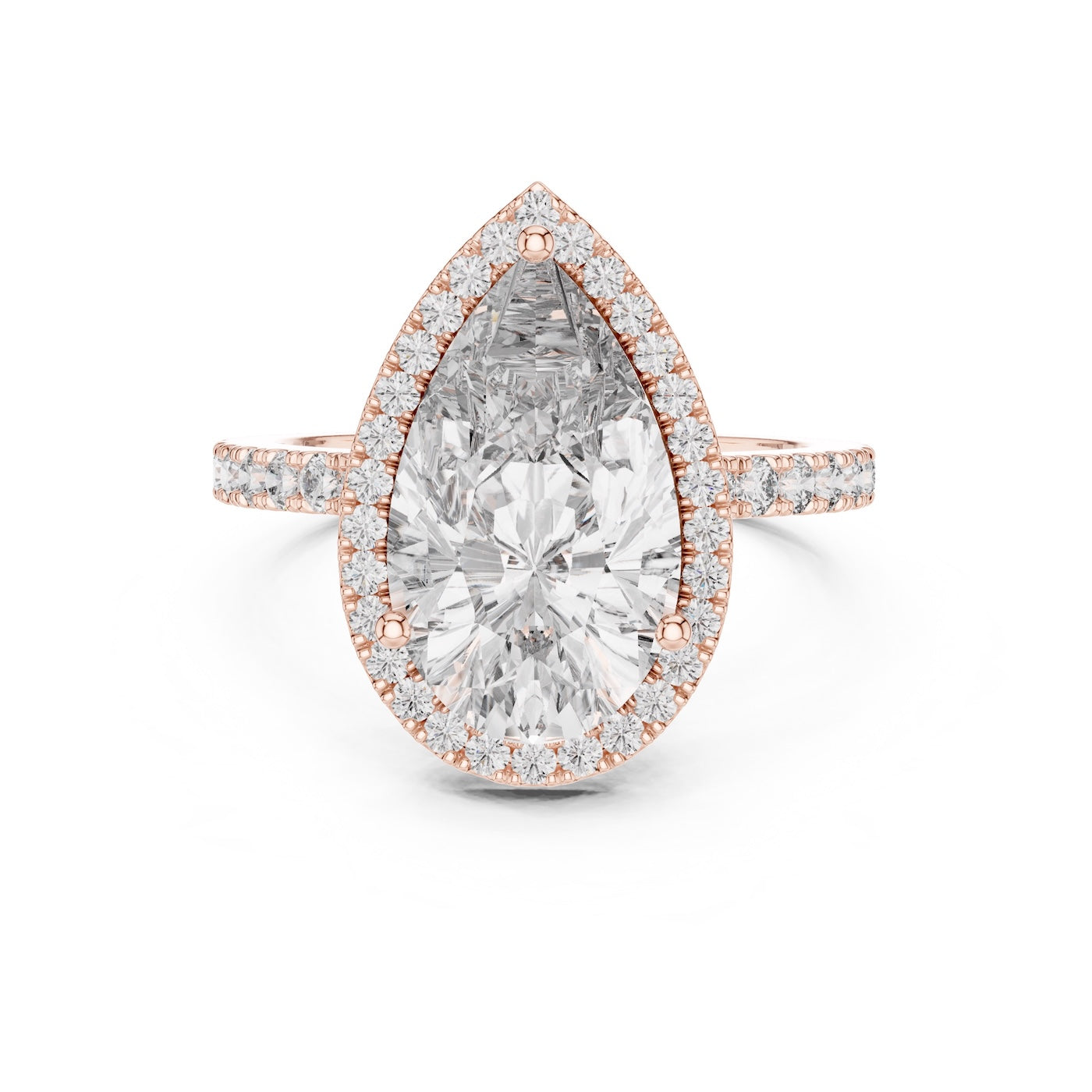 Rose-gold plated silver ring with a pear-shaped center stone on a white background 