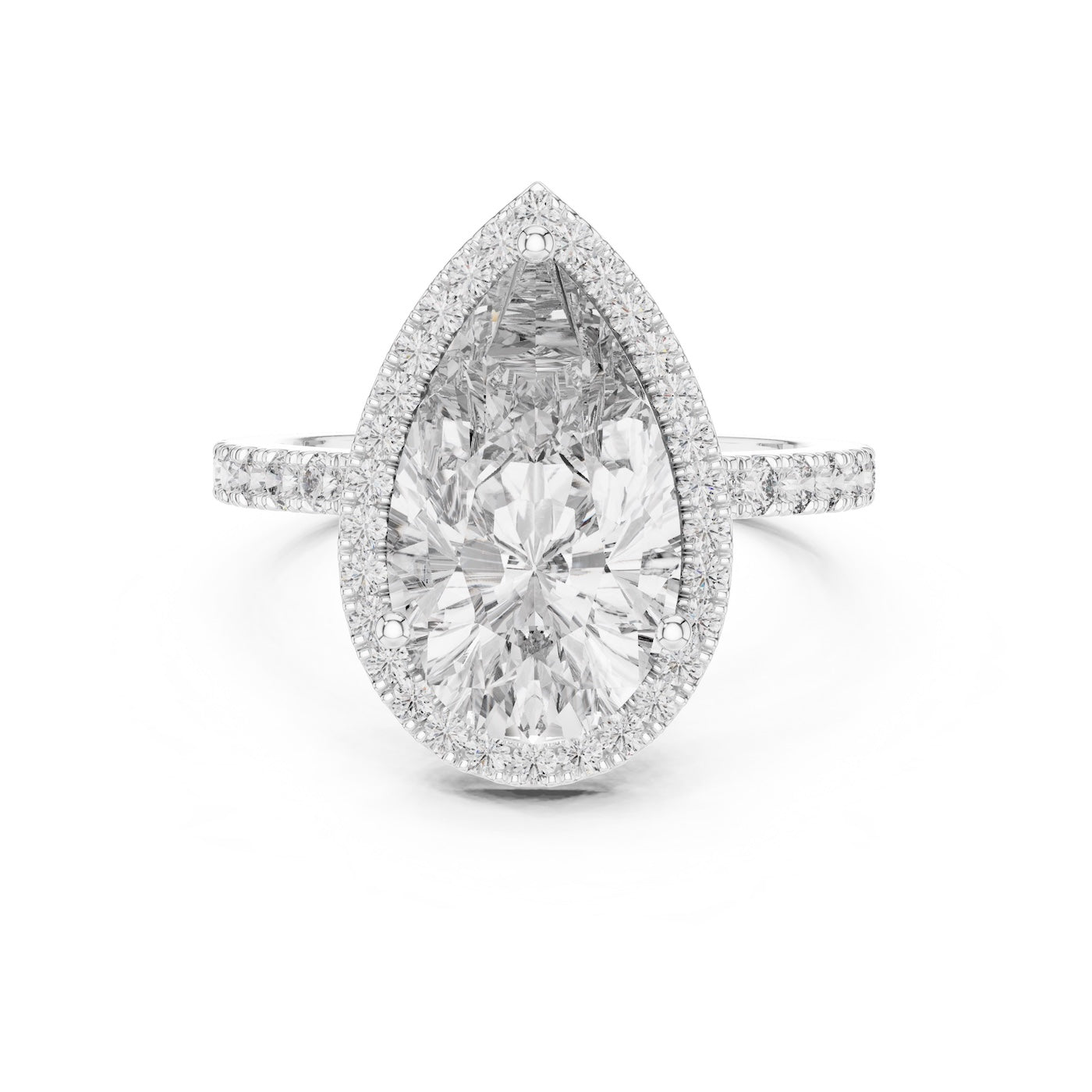 Silver ring with a pear-shaped center stone on a white background 