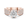 Rose-gold plated Silver ring with a large central zirconia and smaller stones on the sides against a white background #rose-gold