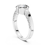 Silver ring with a zircon diamond against a white background 