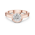 Rose-gold plated Silver ring with a zircon diamond against a white background #rose-gold
