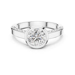 Silver ring with a zircon diamond against a white background 