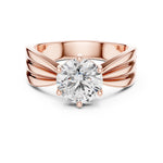 Rose-gold plated Silver ring with a large zircon on a white background 