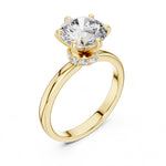 gold plated Silver Ring against a white background 
