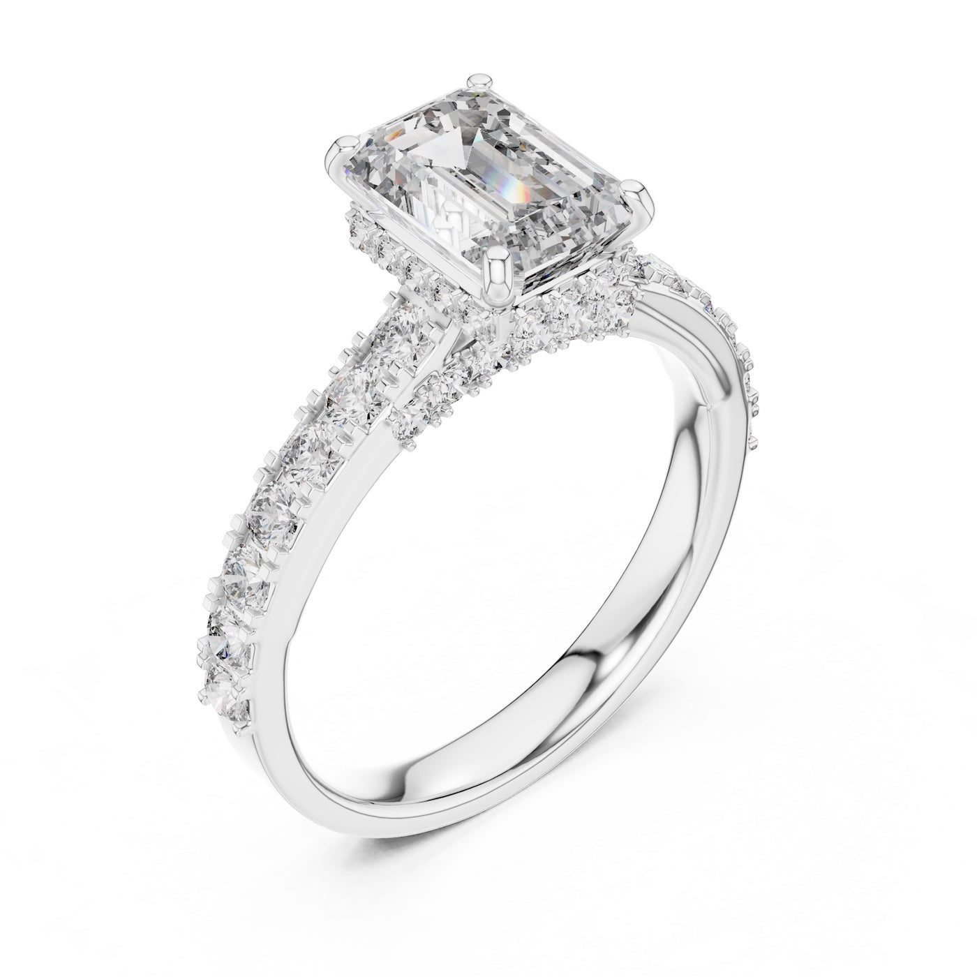 Silver ring with a central emerald-cut diamond and smaller diamonds on a white background 