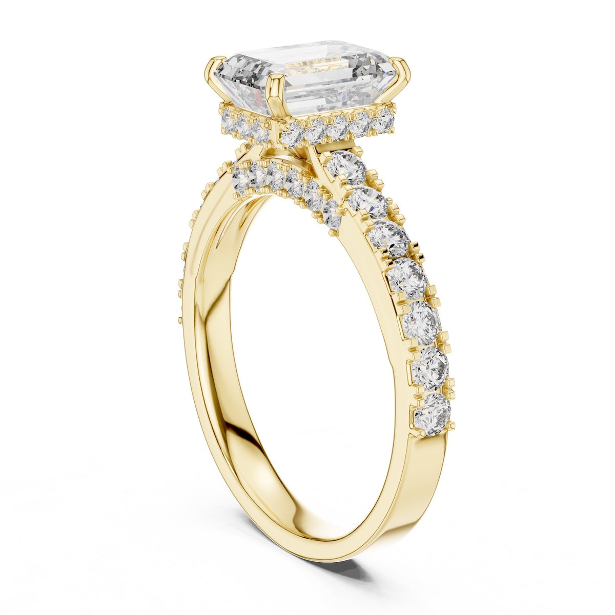 gold plated Silver ring with a central emerald-cut diamond and smaller diamonds on a white background 