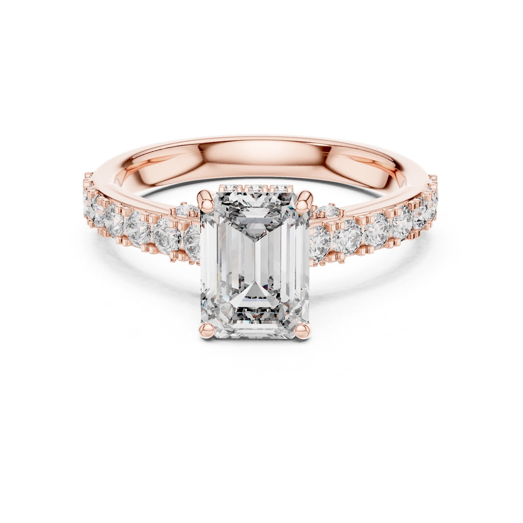 Rose-gold plated Silver ring with a central emerald-cut diamond and smaller diamonds on a white background #rose-gold