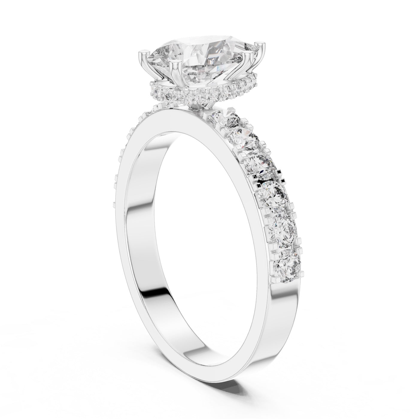 Silver ring with a pear-shaped center stone on a white background 