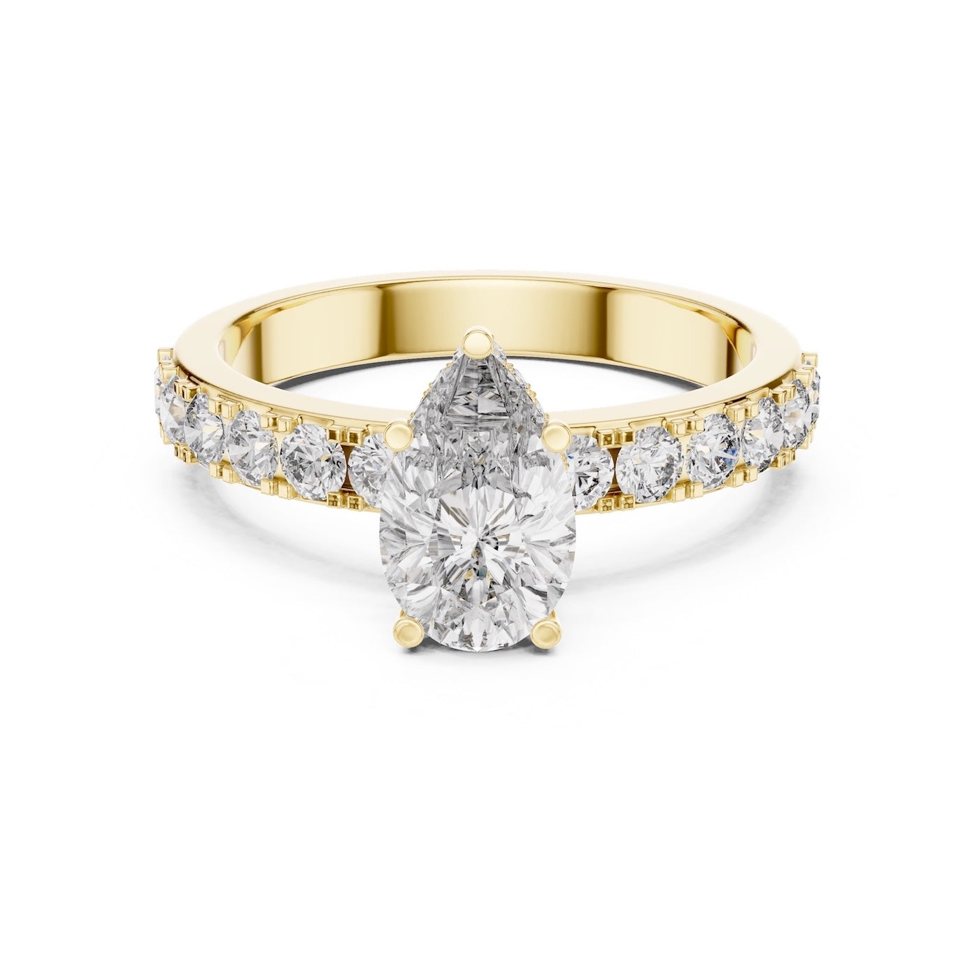 gold plated silver ring with a pear-shaped center stone on a white background #yellow-gold