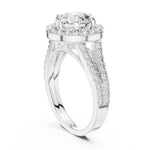 Silver ring with a round white zirconia and zircon-studded band on a white background 